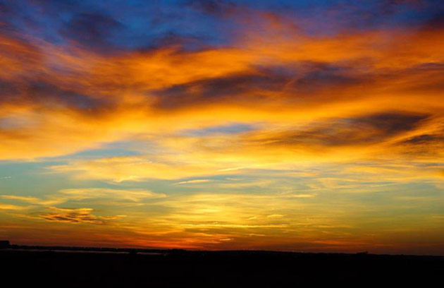 Colored clouds over the wetlands.